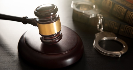 judge gavel and handcuffs