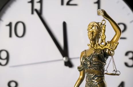 Clock and lady justice.